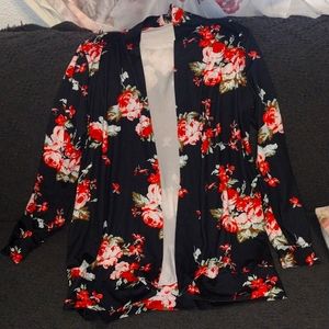 Black floral long sleeve open faced jacket. Size large.